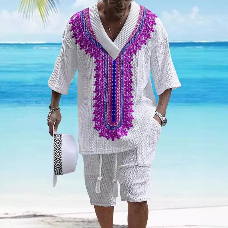 Men's grey knitted short-sleeved drop-shoulder top with matching shorts laid flat.