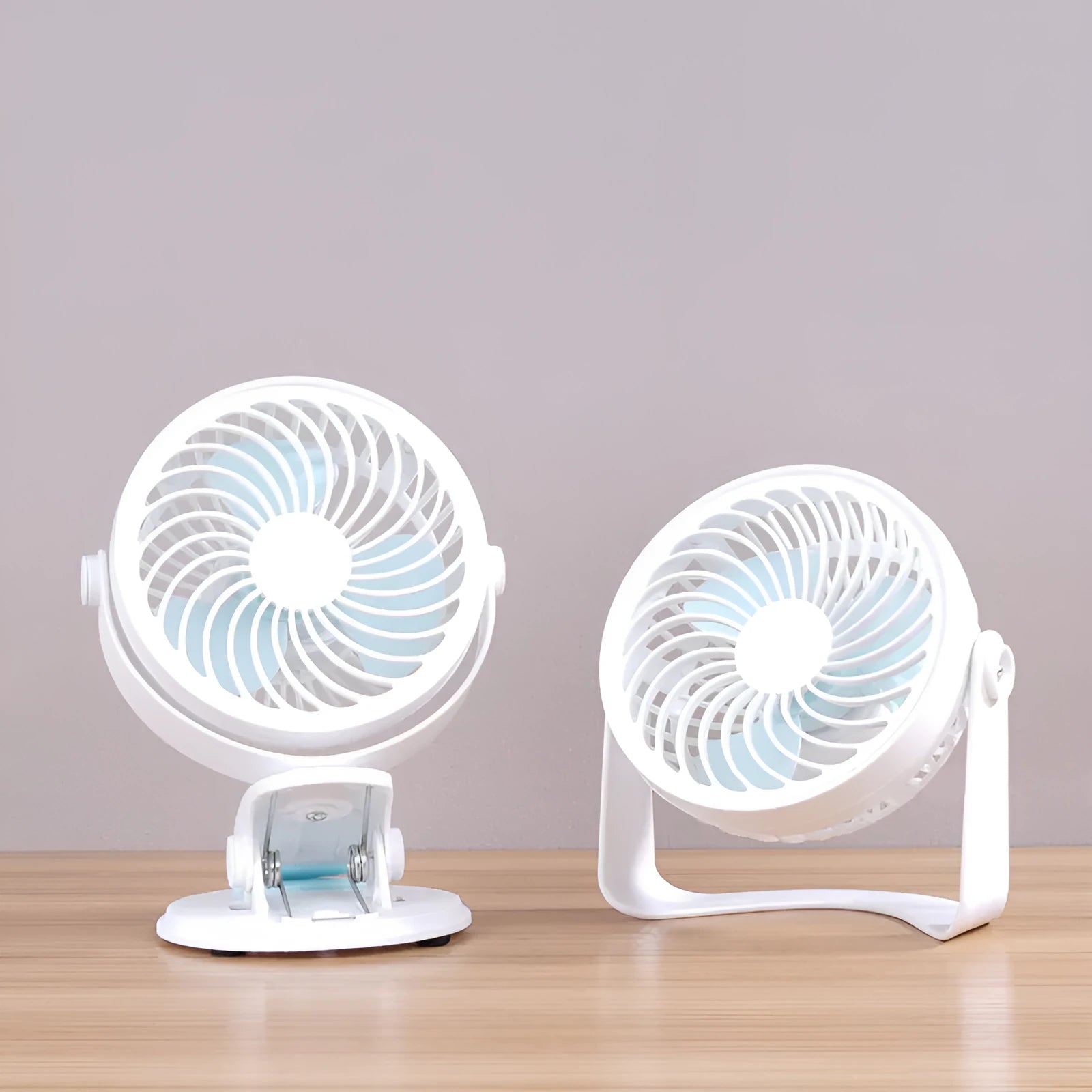 Mini USB desk fan shown in clip-on and floor-standing styles on a wooden desk.