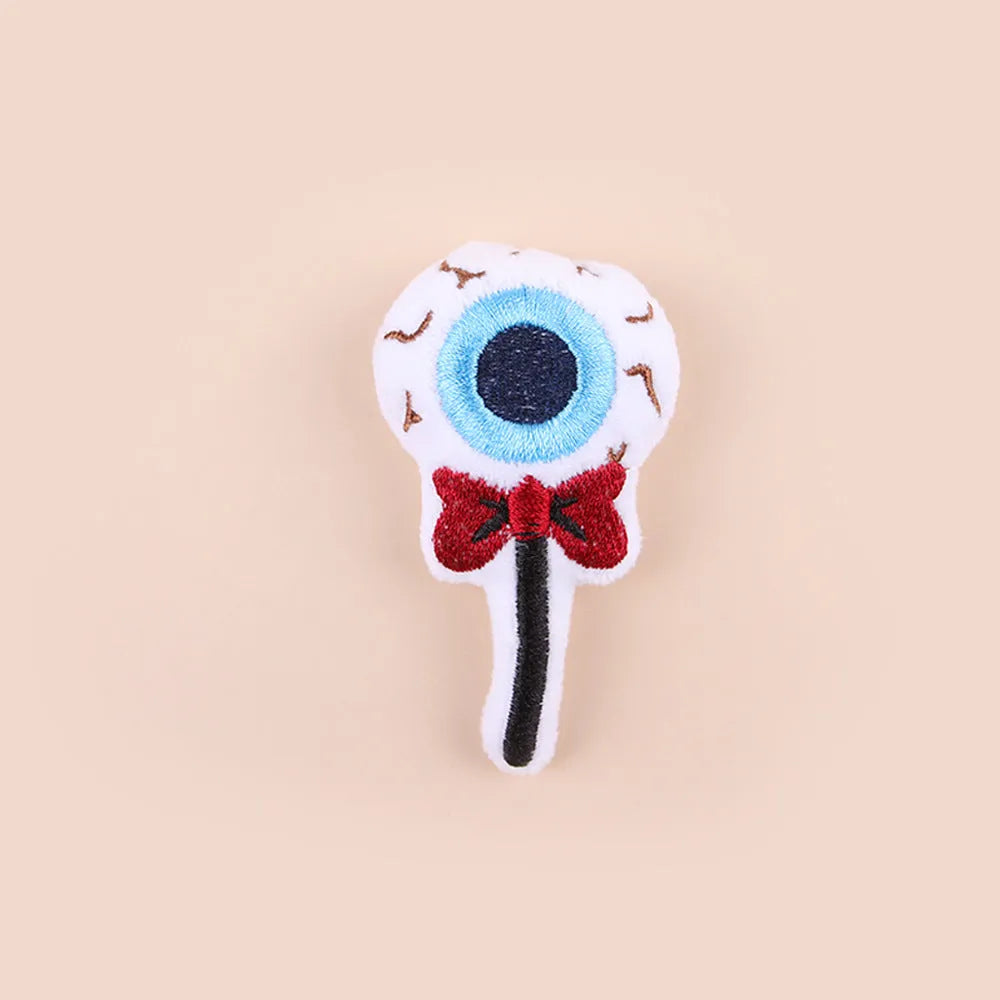 Colourful plush cat teaser toy with flexible wand showing candy and eyes designs