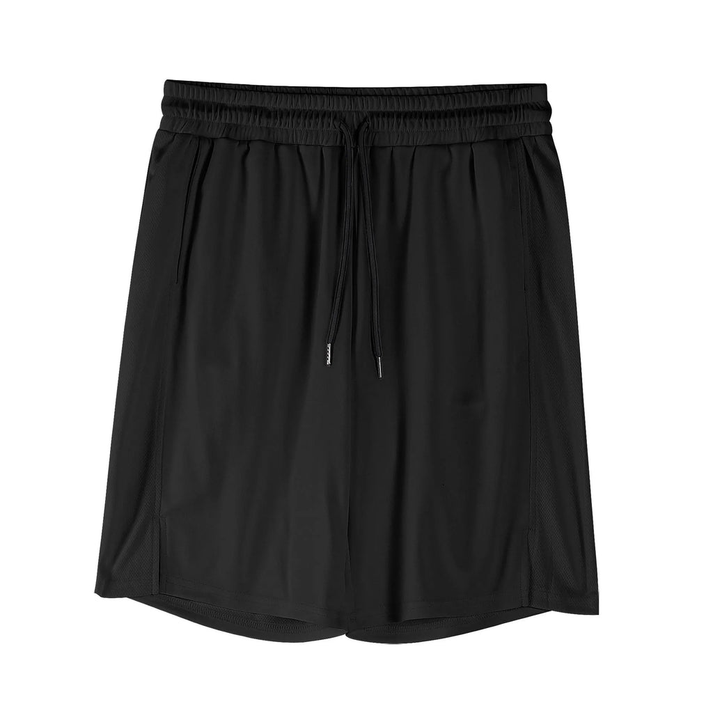 Man wearing black quick-drying mesh fitness shorts with an elastic mid-waist and loose fit.