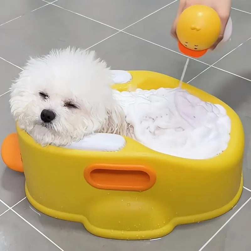 Blue PVC duck-shaped bathtub for washing a small dog or cat, a non-electric portable pet washing tub.