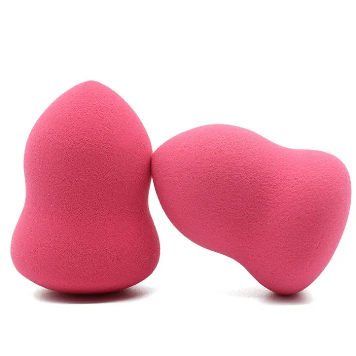 Pink cubic makeup foundation sponge with hydrophilic non-latex material for wet and dry use.
