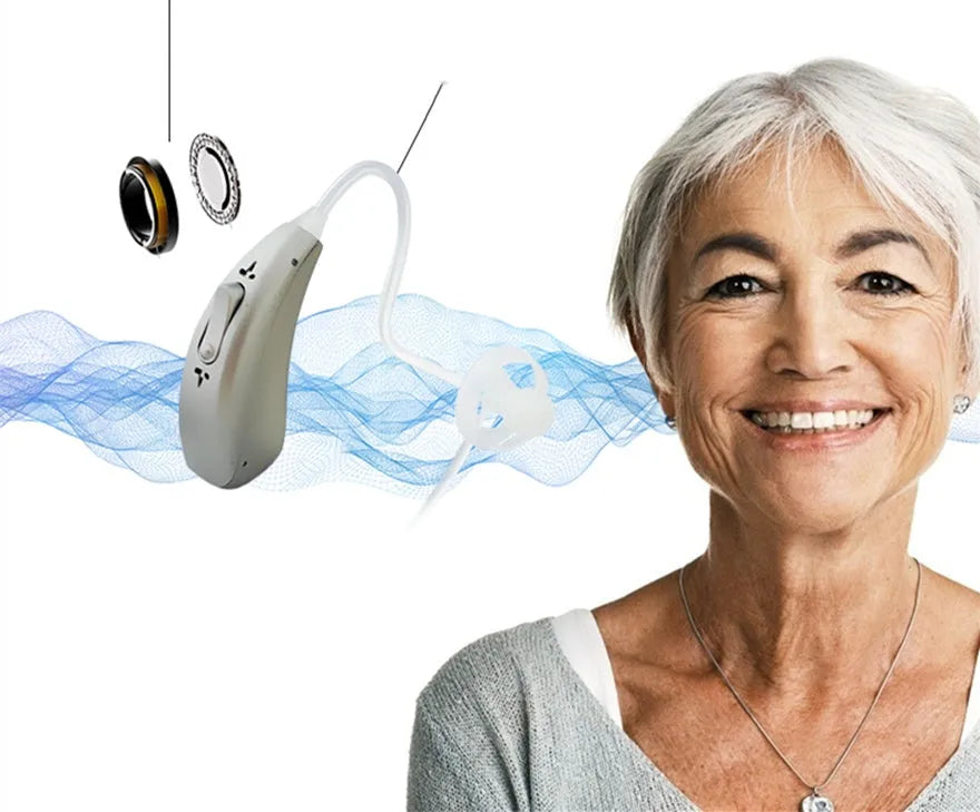 Wireless invisible rechargeable hearing aid with USB charging case on a table