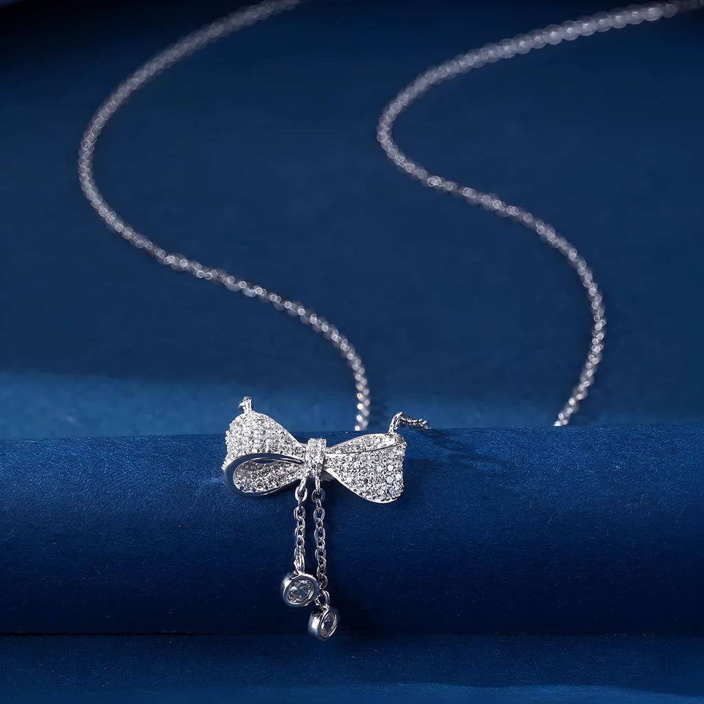 S925 sterling silver bow pendant necklace with adjustable chain for women