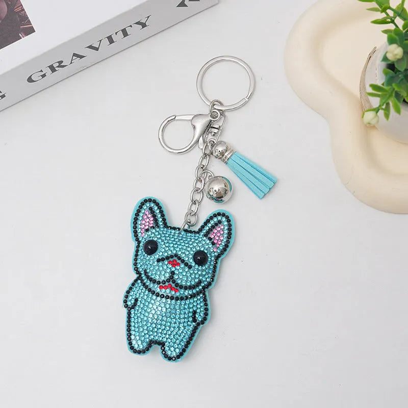 Rhinestone cartoon French bulldog keychain pendant on a diamond-shaped alloy base.