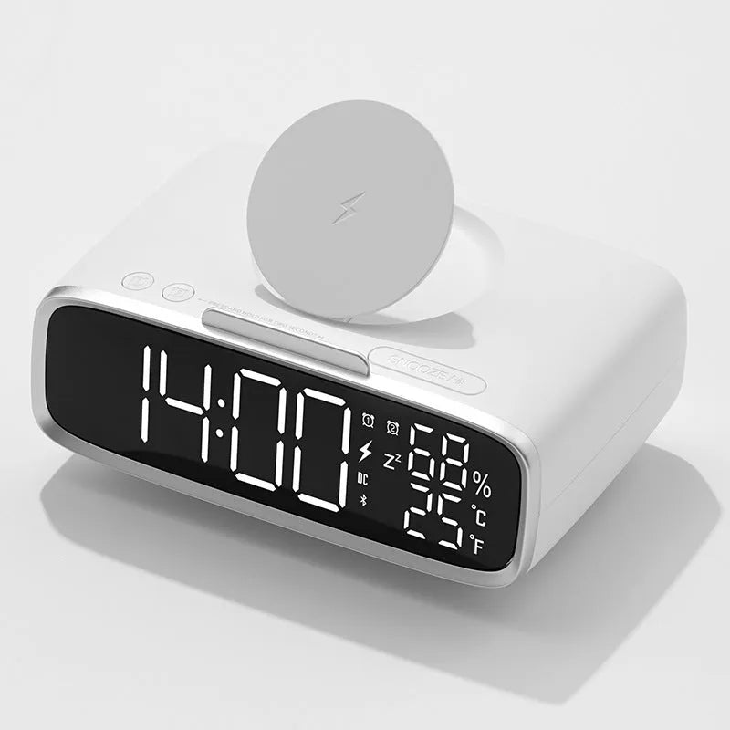 White wireless charging Bluetooth speaker with night lamp functions on bedside table