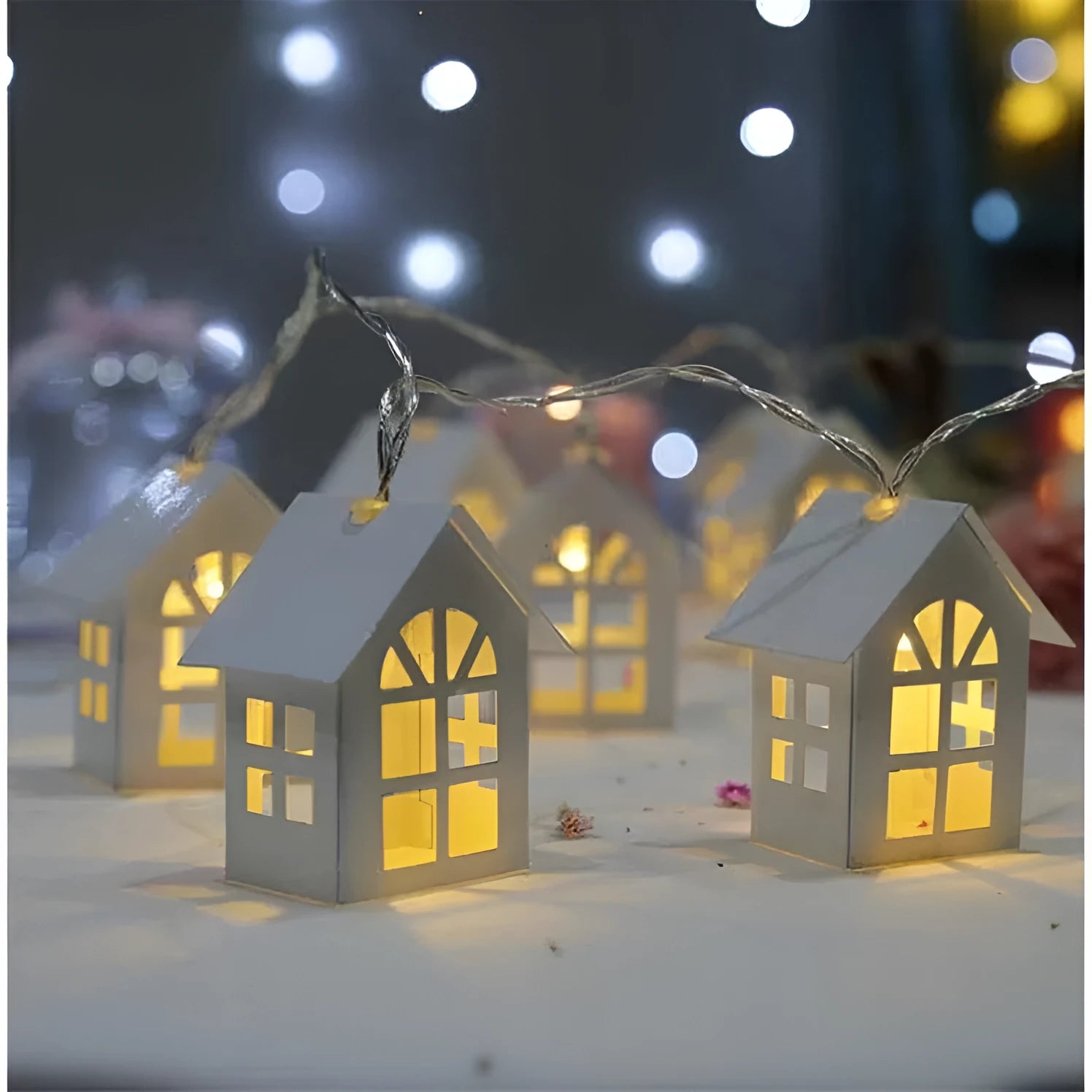 10 LED wood house fairy light string 2M with warm white glow on a Christmas tree