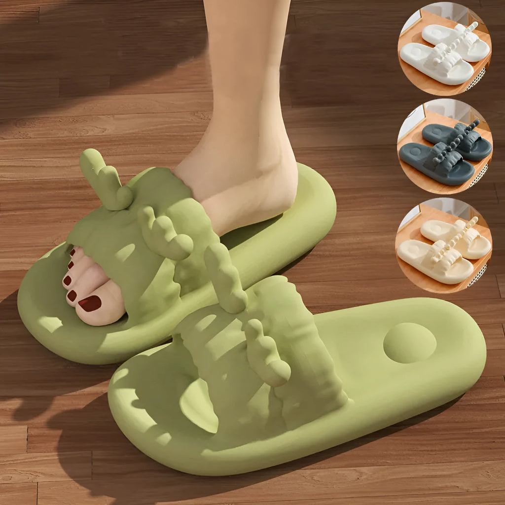 Deer horn design EVA flip flop slippers in light yellow on a white background.