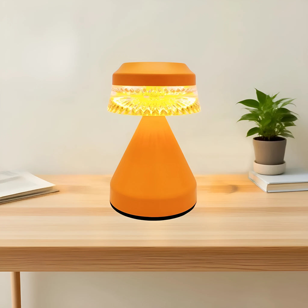 Black, brown, and orange USB-powered LED night lamp with electrodeless dimming on a surface.