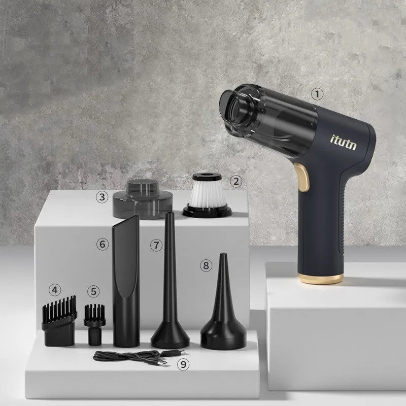 Black wireless car vacuum cleaner with accessories including nozzles and brush heads