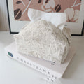 Chinese pastoral style cotton fabric tissue box cover in floral design on a table