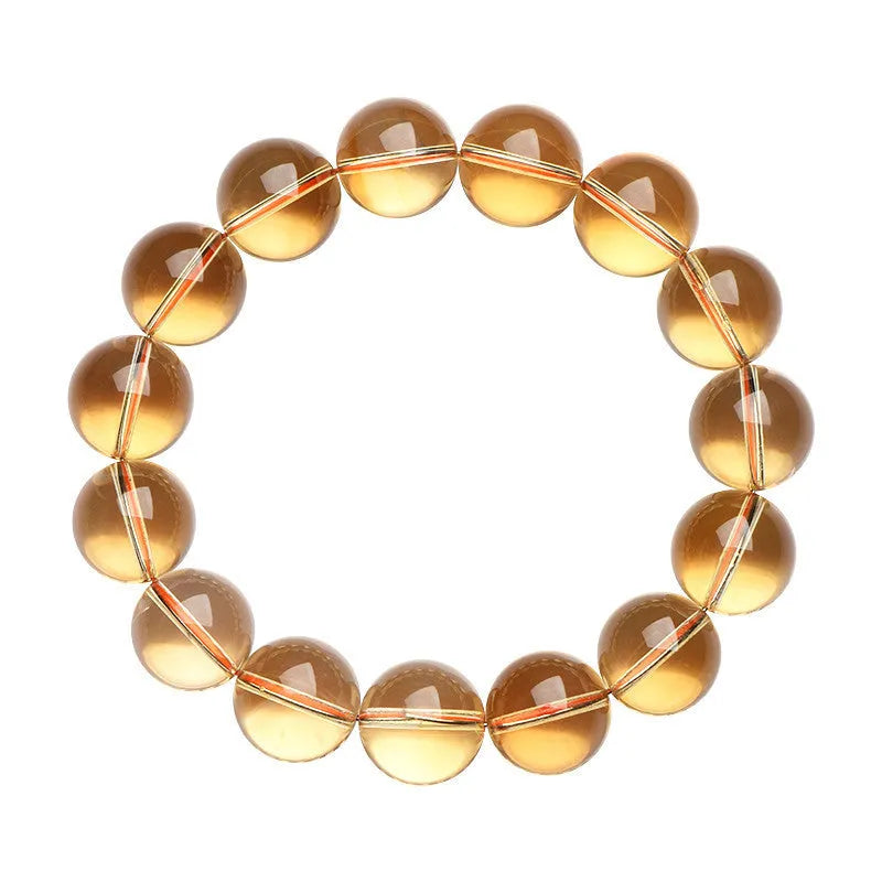 Natural citrine scattered beads ball bracelet showing polished beads on a bracelet base.