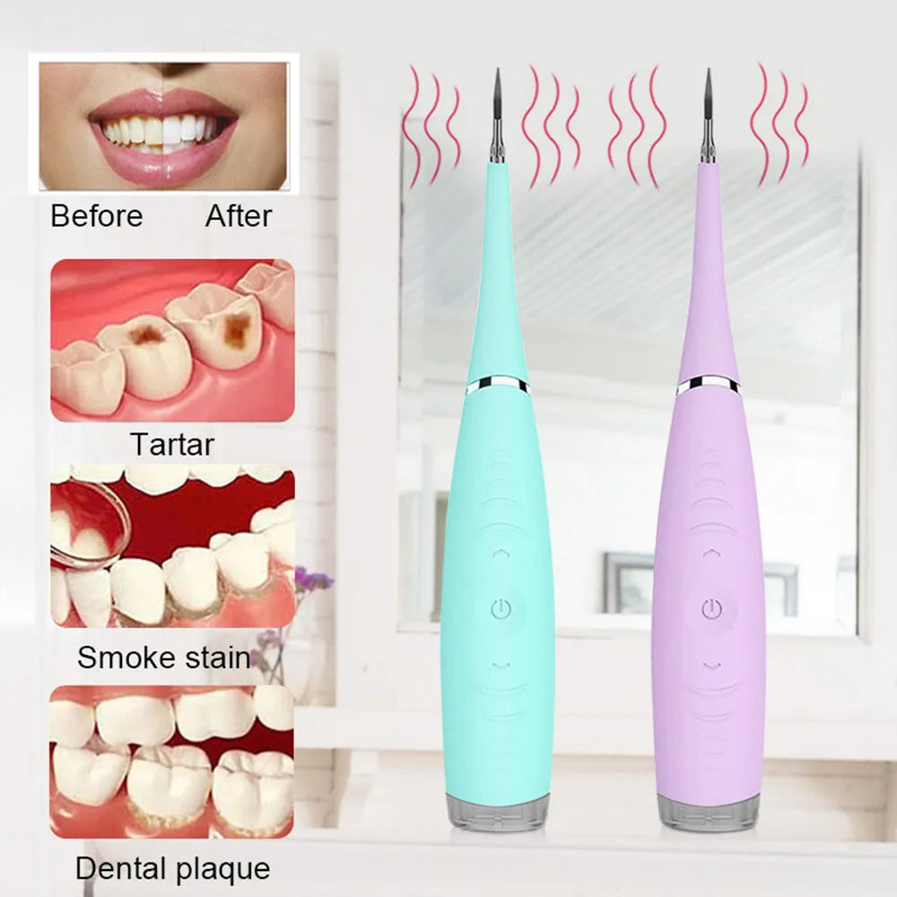 Pink and blue waterproof electric dental calculus remover tool on a white background