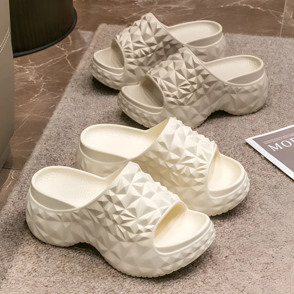 Women's khaki high heel flip flop slippers with a thick moulded EVA sole.