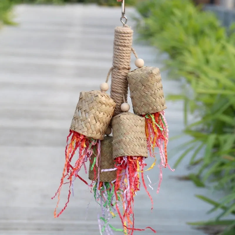 Colourful wood and sisal rope parrot foraging toy measuring 15cm by 35cm