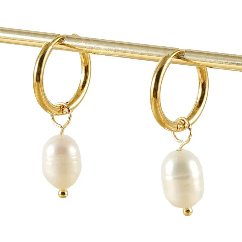 Gold geometric pearl earrings for women made from stainless steel and titanium steel wire.