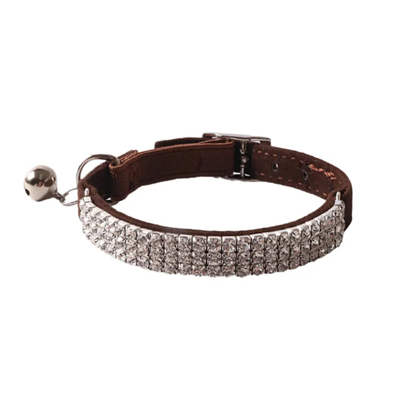 A soft flocking fabric cat collar with a gang drill pattern and an elastic buckle, shown in one of six available colours.