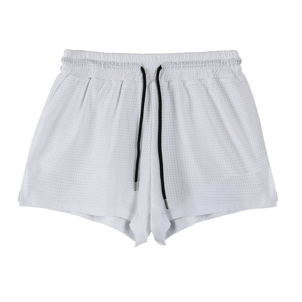 Men's black and white quick-dry nylon shorts for summer sports.