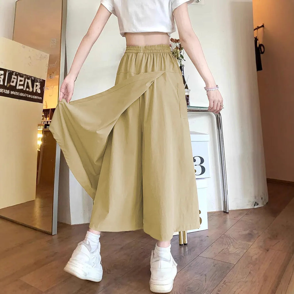 Camel coloured women's wide leg skirt with elastic waist and cropped length