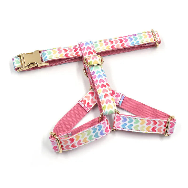 Pink dog harness with gold buckle and heart-shaped stone decoration for small dogs