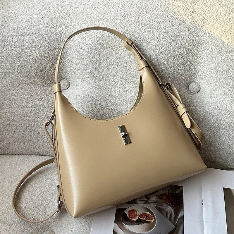 Women's apricot genuine leather crossbody bag showing dumpling shape and sandwich pocket design