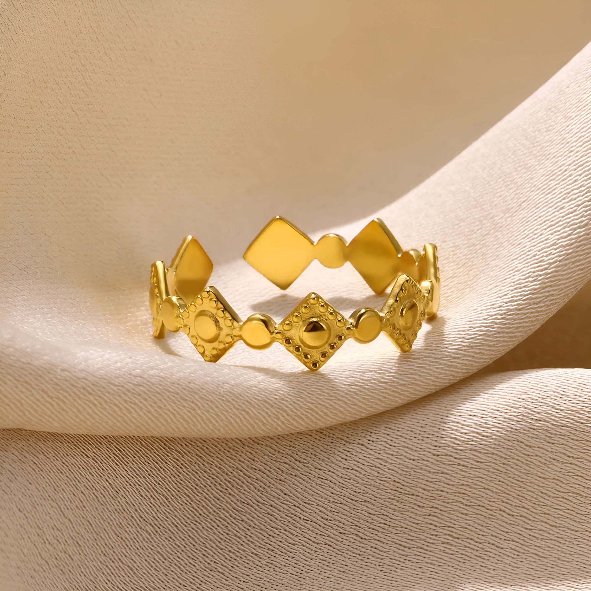 Geometric titanium steel women's ring with gold diamond finish showing free size fit