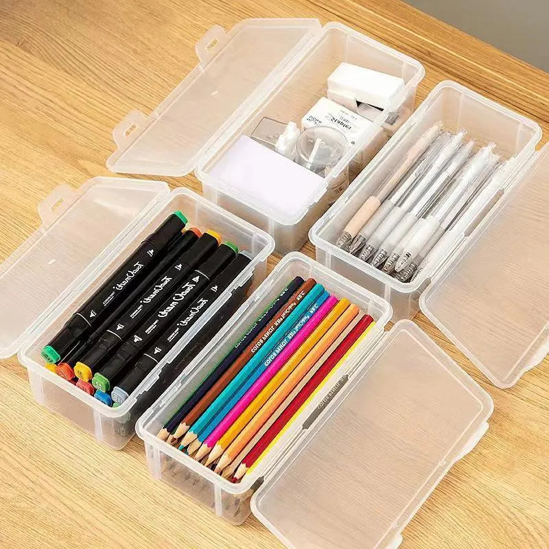 Clear plastic stationery storage box filled with assorted coloured pencils and crayons.