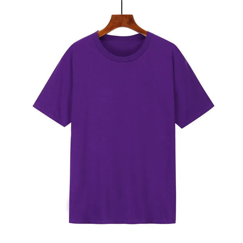 Men's loose fit black cotton T-shirt with short sleeves on a hanger.