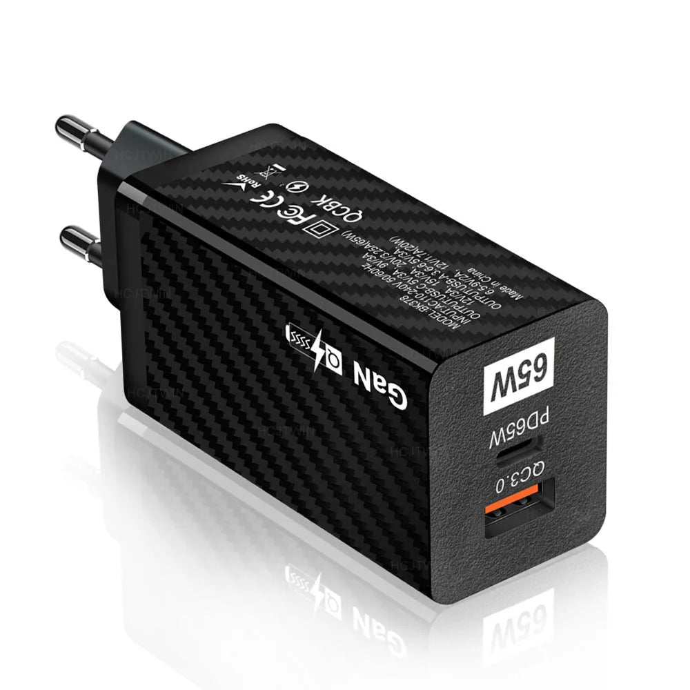 65W GaN universal laptop charger with UK, US, and EU plug heads in black or white