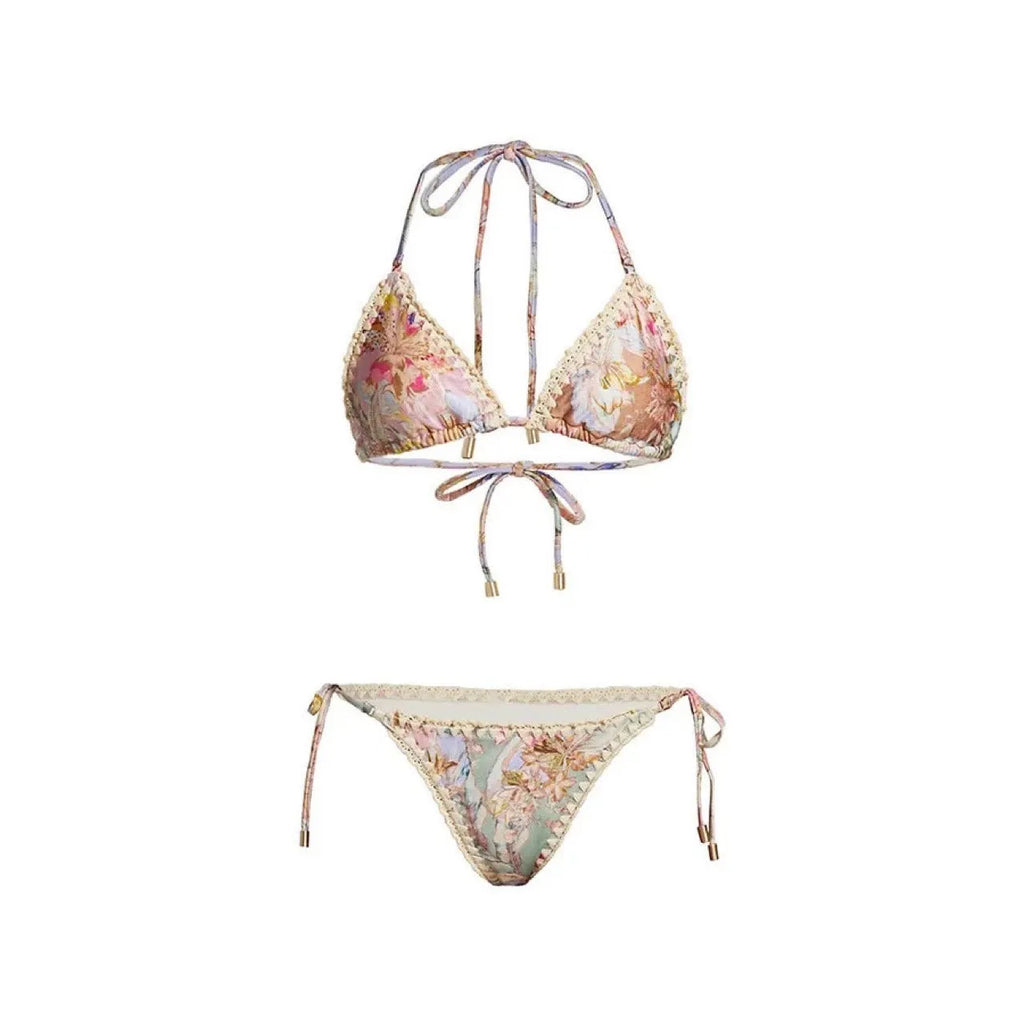 Women's creamy-white floral pattern bikini suit with matching skirt