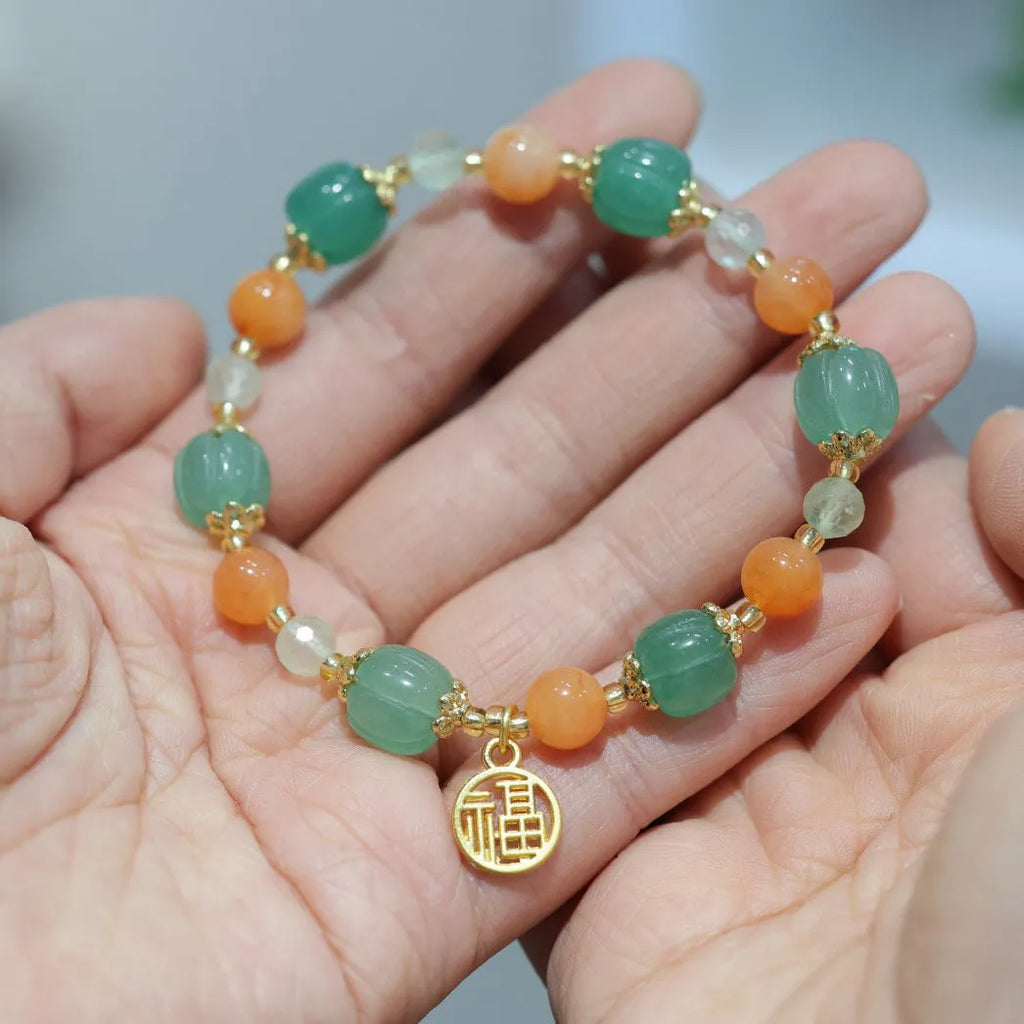 Traditional Chinese Duobao pumpkin bracelet with Jinsi Jade barrel beads and Prehnite accents