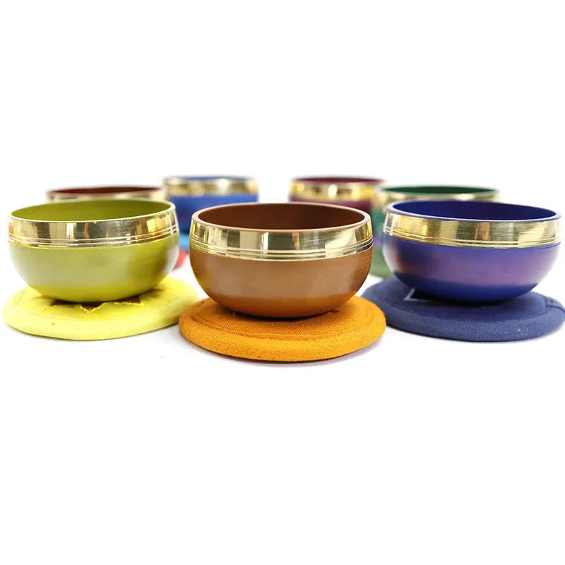 Handmade 8 cm diameter metal singing bowl in a choice of seven colours for meditation and yoga.
