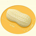 Yellow peanut-shaped dog chew toy with squeaker for dental cleaning