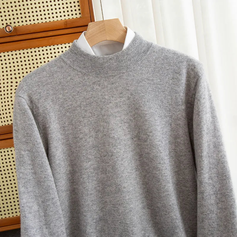 Men's half-collar wool sweater in loose fit showing half-turtleneck collar and regular sleeve design.