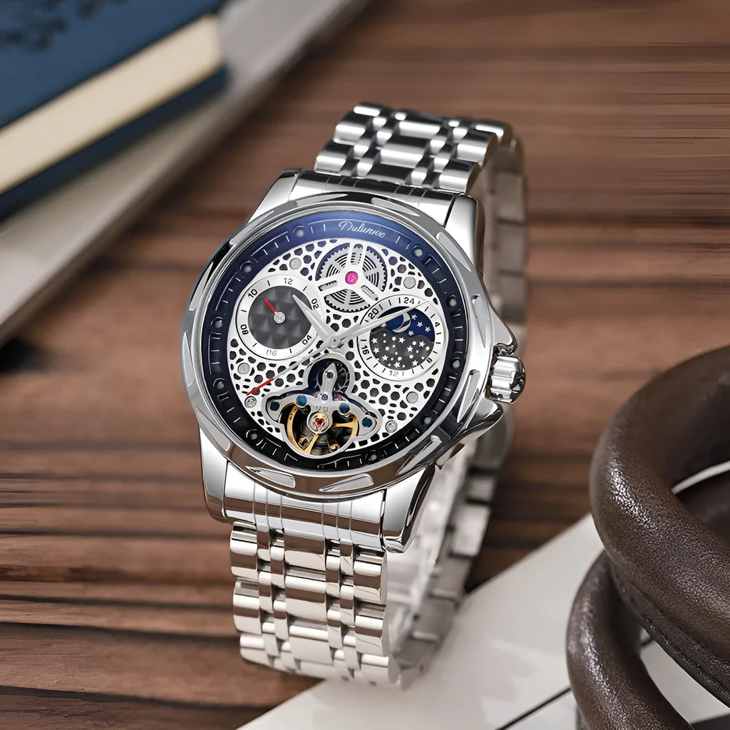 Men's automatic watch with luminous hands on a black dial, fitted on a stainless steel bracelet.