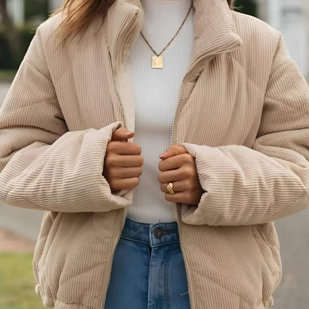 Women's apricot corduroy wadded jacket with stand collar and full-length front zipper.