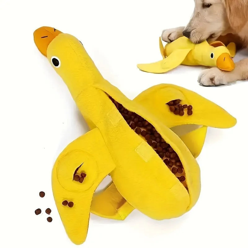 Yellow teddy dog toy with duck sound mechanism and food leak holes for treat dispensing