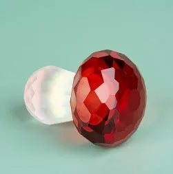 Colourful geometric mushroom ornament made of white crystal in four colour options.