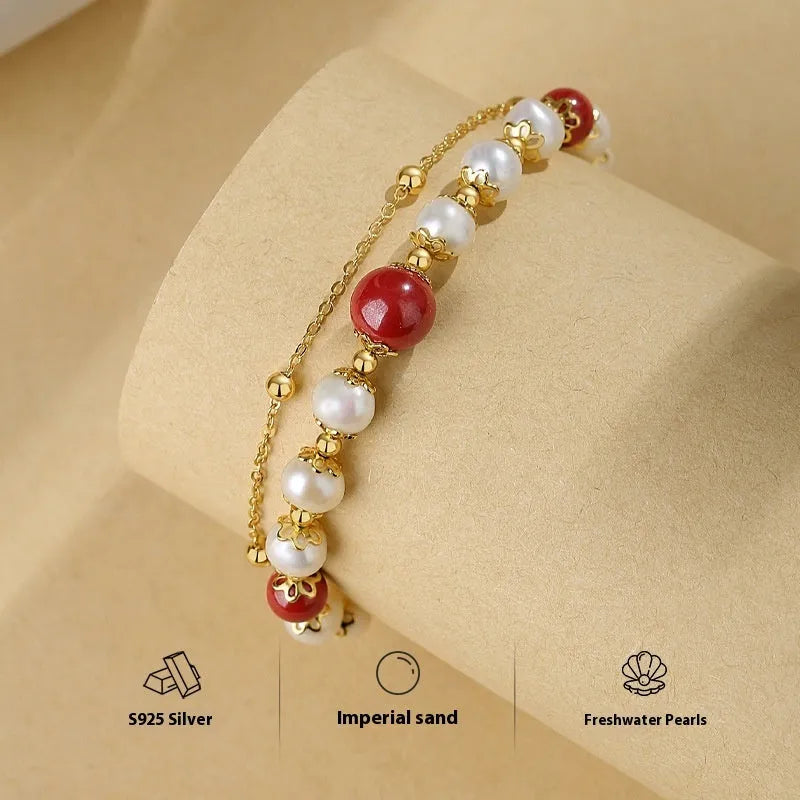 Sterling silver double-layer bracelet with cinnabar red beans and freshwater pearls in geometric design