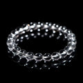 Natural white crystal bracelet with round beads, showing unisex geometry design on a wrist.