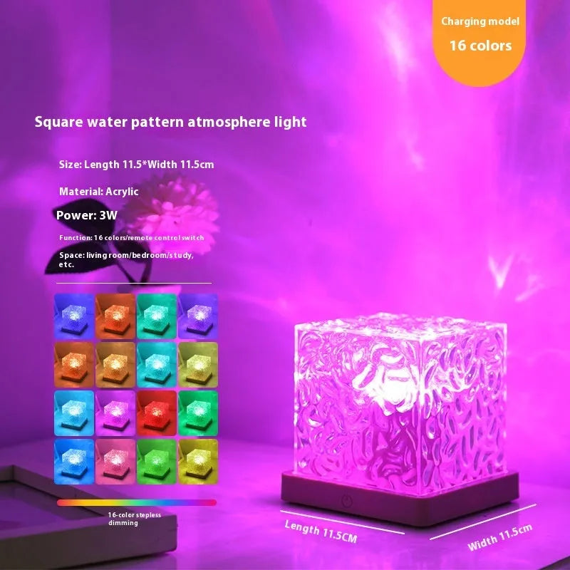 LED water ripple night light with rotating crystal projection and remote control on wooden surface