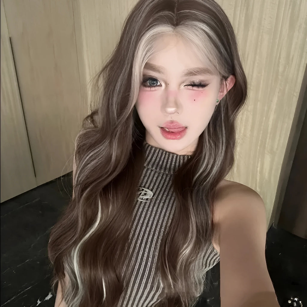 Long curly synthetic wig in grey gold colour with highlights and lace front.