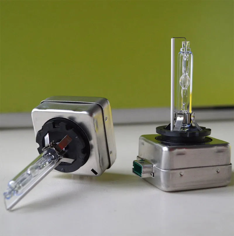 Xenon car headlight bulb and lens assembly in aluminium shell for D1S or D1R fitment.