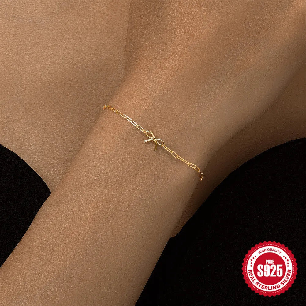 S925 sterling silver bracelet with clip chain and geometric heart charm in gold colour