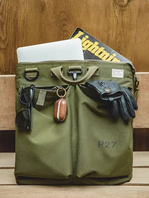 Marden Tooling canvas crossbody bag in military green with laptop compartment showing retro styling