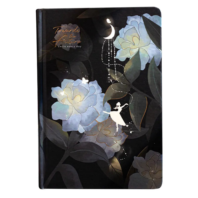 A5 diary book with a luminous purple cover, open to show pages with colour illustrations.