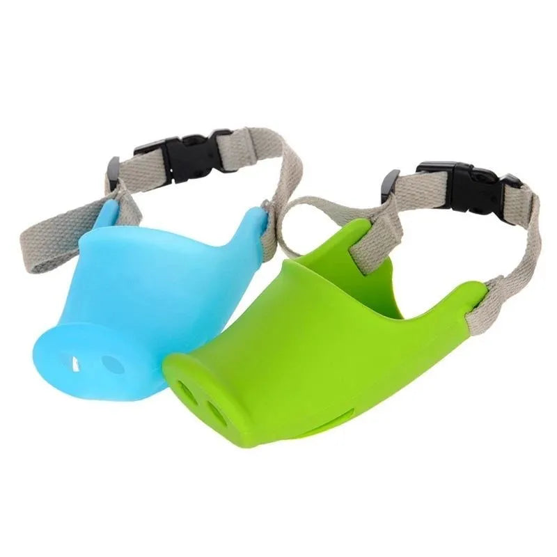 Green silicone anti-bite mouth cover muzzle for a long-mouthed dog on a white background.