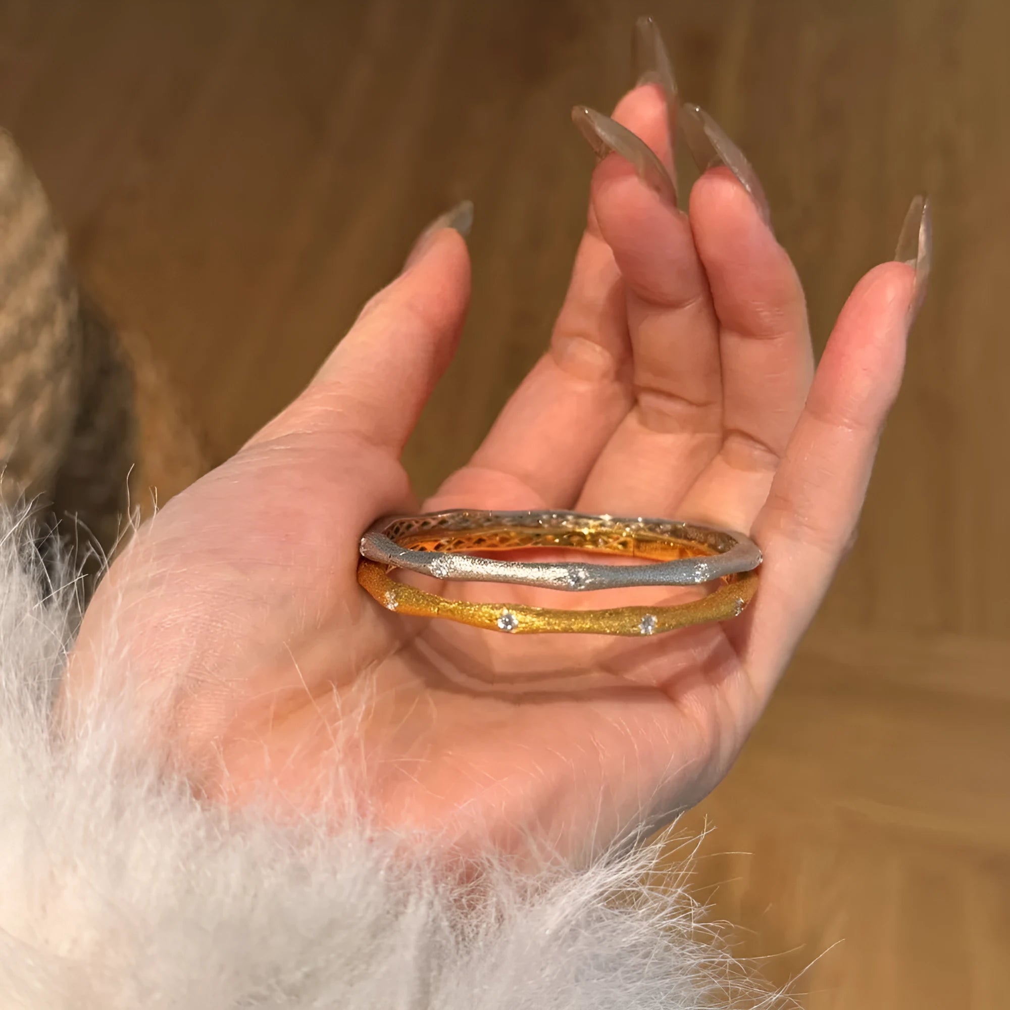 925 silver gold finish wire drawing bracelet with zircon inlay on white background