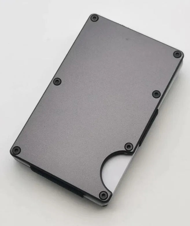 Aluminium alloy grey carbon fibre wallet with RFID blocking, showing card slots.