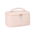 Open-top women's makeup bag in PU leather shown in a selection of solid colours.